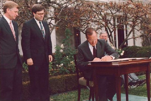 Bush signs Civil Rights Commission Reauthorization